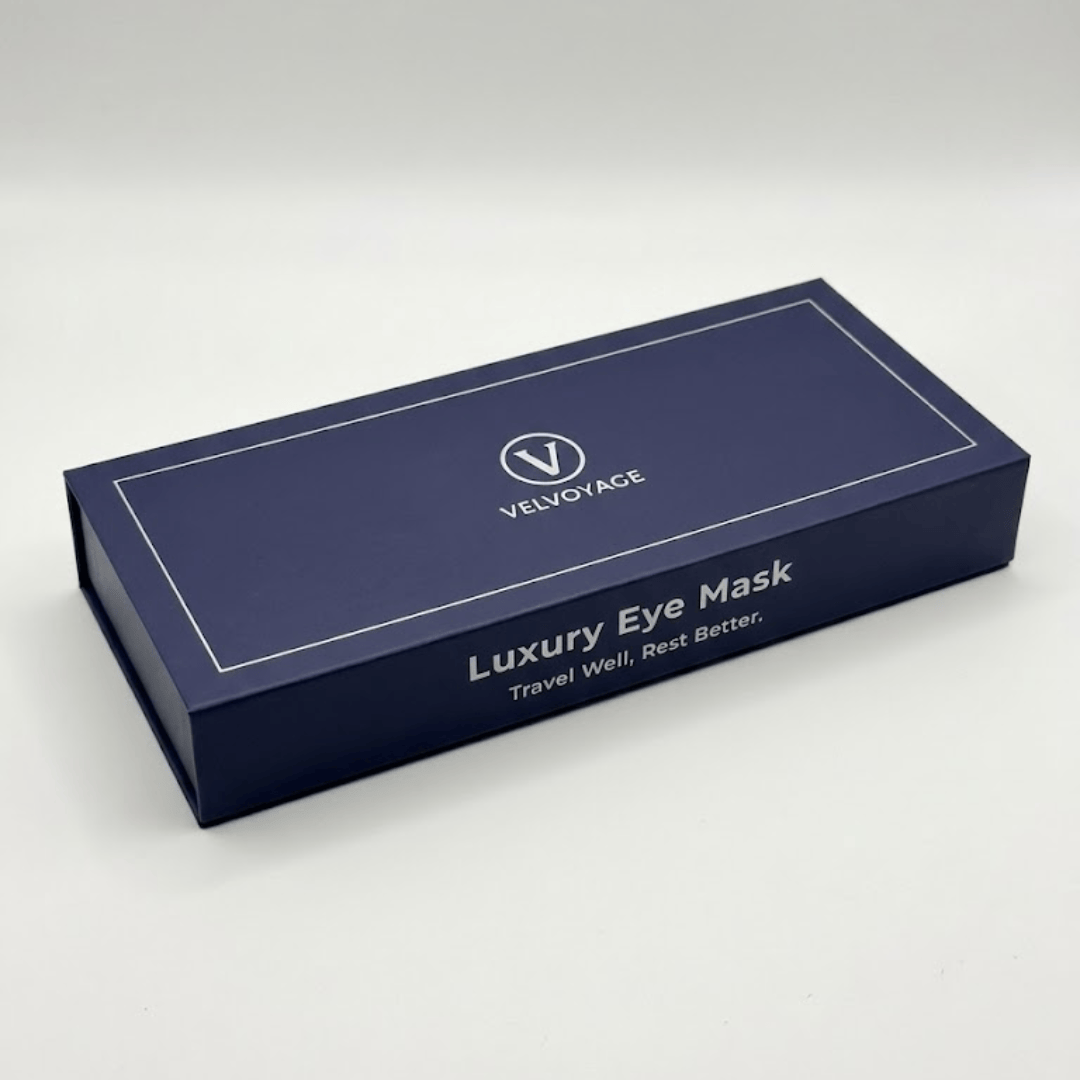 Blue box of Velvoyce luxury eye mask on a white background